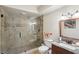 Bathroom with a large glass enclosed shower and marble vanity top at 440 Belada Blvd, Sandy Springs, GA 30342