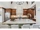 Gourmet kitchen with stainless steel appliances, large island, custom cabinets and recessed lighting at 440 Belada Blvd, Sandy Springs, GA 30342
