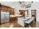 Kitchen features stainless steel appliances, granite countertops, pendant lights and hardwood floors at 440 Belada Blvd, Sandy Springs, GA 30342