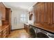 Well-equipped laundry room with wooden cabinets and modern washer and dryer units for convenience at 440 Belada Blvd, Sandy Springs, GA 30342