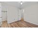 The bedroom features wood flooring and doors to a closet and another room at 6165 Picketts Nw Rdg, Acworth, GA 30101