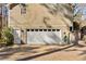 Spacious garage features a white door, and additional storage space at 6165 Picketts Nw Rdg, Acworth, GA 30101