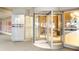 Modern building entrance with revolving doors and a clear view of the stylish lobby and Metropolis signage at 943 Peachtree Ne St # 2009, Atlanta, GA 30309