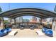 Beautiful condo patio boasts multiple seating areas and a grill, perfect for outdoor dining and entertaining at 943 Peachtree Ne St # 2009, Atlanta, GA 30309