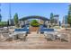 Condo patio area features comfortable seating, a dining area, and beautiful views of the city at 943 Peachtree Ne St # 2009, Atlanta, GA 30309