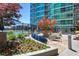 Outdoor pool with a beautiful view, comfortable seating, and lush landscaping at 943 Peachtree Ne St # 2009, Atlanta, GA 30309
