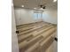 Bedroom with new floor, fan, and a view of backyard at 2520 Deerfield Nw Dr, Kennesaw, GA 30144