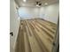 Spacious bedroom featuring light colored flooring and a ceiling fan at 2520 Deerfield Nw Dr, Kennesaw, GA 30144