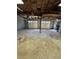 Two car garage showcasing two garage doors and concrete floors at 2520 Deerfield Nw Dr, Kennesaw, GA 30144