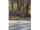 Wooden Deerfield Park Trail sign, located at entrance to a walking trail at 2520 Deerfield Nw Dr, Kennesaw, GA 30144