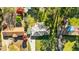 This aerial view highlights the home's roof, yard, and proximity to neighboring houses at 409 Shannon Way, Lawrenceville, GA 30044