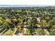 Serene aerial shot showcases a leafy neighborhood with well-spaced houses and verdant trees at 409 Shannon Way, Lawrenceville, GA 30044
