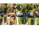 An aerial view shows a home in its neighborhood setting, with driveway and lawn at 409 Shannon Way, Lawrenceville, GA 30044