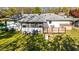 Charming home features a cozy back porch and a lush green lawn for outdoor enjoyment at 409 Shannon Way, Lawrenceville, GA 30044