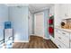 Kitchen area with stainless steel wall oven, and modern cabinetry at 409 Shannon Way, Lawrenceville, GA 30044