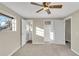 Bedroom with carpet, a closet, and a bathroom view at 6198 Rocky Creek Dr, Douglasville, GA 30135