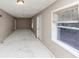 Spacious basement with potential for storage, recreation, or future customization with natural light from the window at 2084 Snow Sw Rd, Atlanta, GA 30311