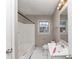 Bathroom featuring neutral wall and white sink, toilet and bathtub at 2084 Snow Sw Rd, Atlanta, GA 30311