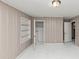 Bedroom featuring neutral wall and a built-in shelves at 2084 Snow Sw Rd, Atlanta, GA 30311