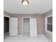 Bedroom featuring neutral wall and storage rooms at 2084 Snow Sw Rd, Atlanta, GA 30311
