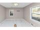 Bedroom with ceiling fan, neutral walls and windows at 2084 Snow Sw Rd, Atlanta, GA 30311