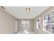Bedroom with natural light from the windows and neutral walls at 2084 Snow Sw Rd, Atlanta, GA 30311