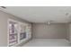 This living room features lots of natural light with gray walls, white trim and ceiling fan at 2084 Snow Sw Rd, Atlanta, GA 30311