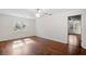 A bright bedroom with wood floors is well lit from windows to the outside at 2938 Thornridge Dr, Atlanta, GA 30340