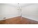 Empty dining room with chandelier and hardwood floors at 2938 Thornridge Dr, Atlanta, GA 30340