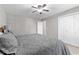 Bedroom featuring a large bed, carpet, and closet at 5336 Monticello Dr, Villa Rica, GA 30180