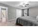 Bedroom featuring a large bed, closet, and a window at 5336 Monticello Dr, Villa Rica, GA 30180
