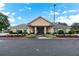 Charming clubhouse with manicured landscaping, creating an inviting atmosphere at 5336 Monticello Dr, Villa Rica, GA 30180