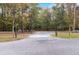 A long, gravel driveway leading to a peaceful, secluded property at 5336 Monticello Dr, Villa Rica, GA 30180