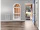 Inviting entryway with a hardwood floor, arched window, and view of the front yard at 5336 Monticello Dr, Villa Rica, GA 30180