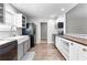 Modern kitchen with stainless steel appliances, wood countertops, and tiled backsplash at 5336 Monticello Dr, Villa Rica, GA 30180