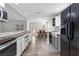 Updated kitchen with stainless steel appliances and views into the living area at 5336 Monticello Dr, Villa Rica, GA 30180