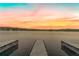 Picturesque sunset view from the docks, showcasing the serene lake at 5336 Monticello Dr, Villa Rica, GA 30180