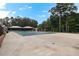 Inviting community pool with covered seating areas, perfect for summer relaxation at 5336 Monticello Dr, Villa Rica, GA 30180