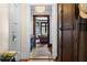 Hallway with hardwood floors, closet, and view into an adjacent room at 81 Peachtree Ne Pl # 1, Atlanta, GA 30309