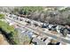 Aerial view of a residential neighborhood featuring lush trees and well-maintained homes at 903 Creek Bottom Rd, Loganville, GA 30052