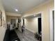 Hallway features neutral wall paint, white trim, and dark flooring at 903 Creek Bottom Rd, Loganville, GA 30052