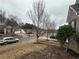 Street view of a tranquil neighborhood with well-kept homes and lush greenery at 903 Creek Bottom Rd, Loganville, GA 30052