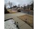 Street view of a neighborhood with well-maintained lawns and houses at 903 Creek Bottom Rd, Loganville, GA 30052