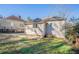 Backyard with a small patio and mature trees, perfect for outdoor relaxation and simple gatherings at 1126 Indale Sw Pl, Atlanta, GA 30310