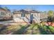 Cozy backyard with mature trees and a simple landscape, offering a tranquil outdoor space at 1126 Indale Sw Pl, Atlanta, GA 30310