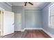 Spacious bedroom with hardwood floors, natural light, and a ceiling fan at 1126 Indale Sw Pl, Atlanta, GA 30310