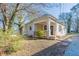 Inviting one-story home with a covered front porch, perfect for enjoying the outdoors at 1126 Indale Sw Pl, Atlanta, GA 30310