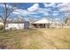A detached garage and fenced backyard are some of the external features of this home at 1729 Spring Ne St, Conyers, GA 30012