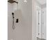 New bathroom features a tiled shower with a rainfall shower head and white subway tile at 1729 Spring Ne St, Conyers, GA 30012