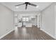 Open concept with hardwood floors leading into a bright and modern kitchen at 1729 Spring Ne St, Conyers, GA 30012